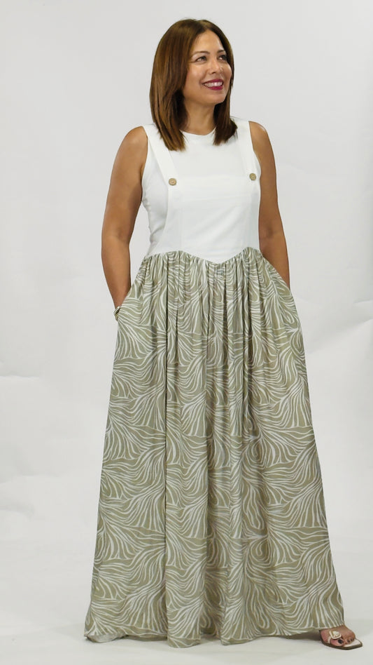 Overall largo con parte superior blanca y falda amplia en tono beige con diseño orgánico.