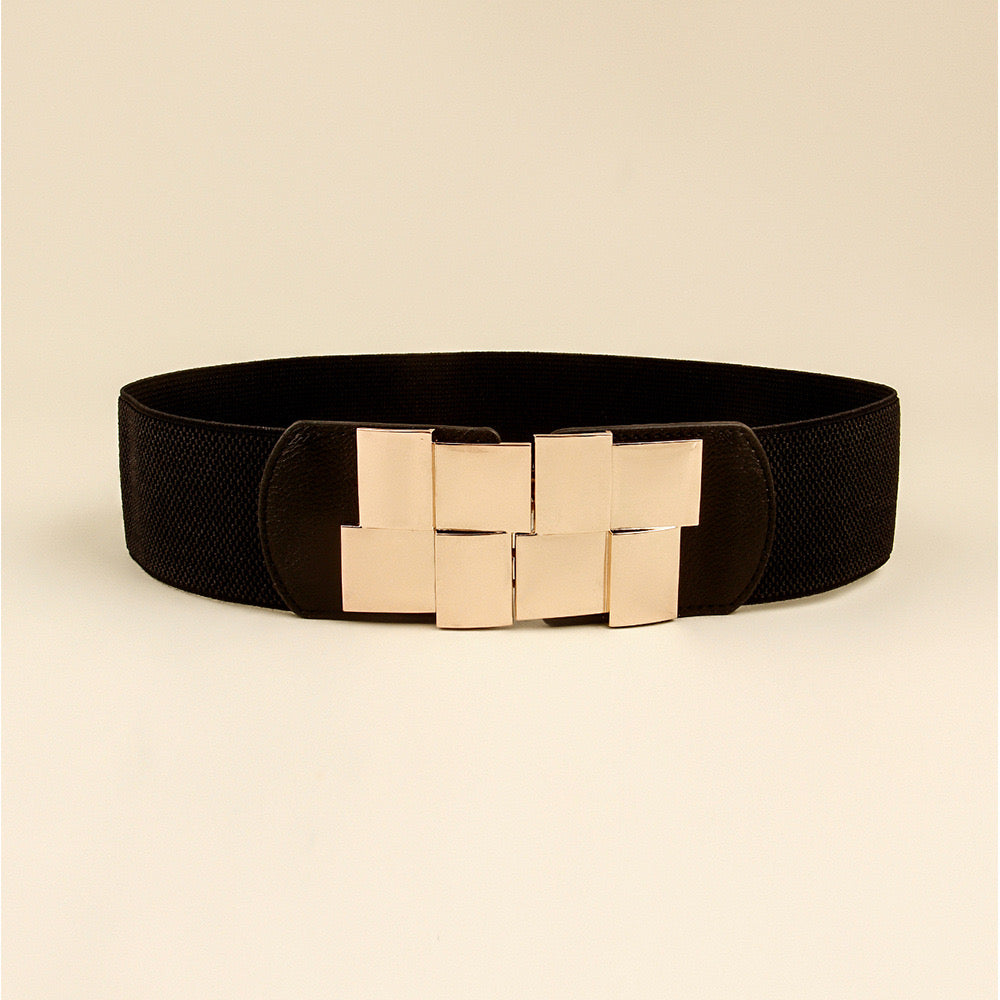 Correa elástica con broche frontal metálico en diseño de bloques.